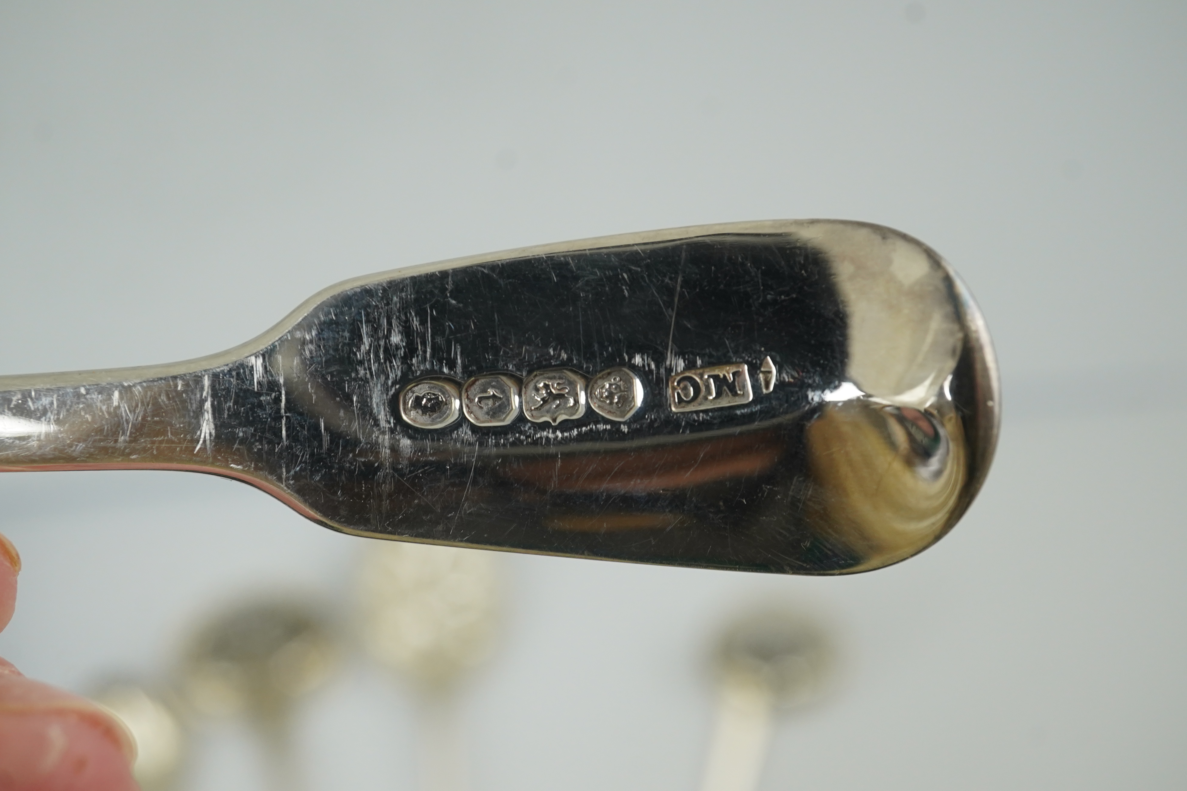 Five Victorian silver 'berry spoons, John Gamage?, Birmingham, 1856, together with eight other silver spoons including two sifter spoons and a sauce ladle